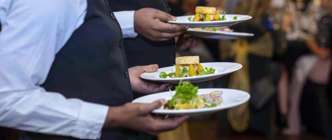 Dinner being served by 1599 team